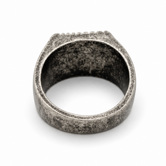 Rear view of antique silver stainless steel signet ring showing textured band and vintage finish