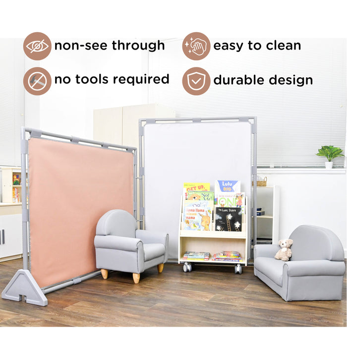 Room divider with pink panel in a room with chairs and books.