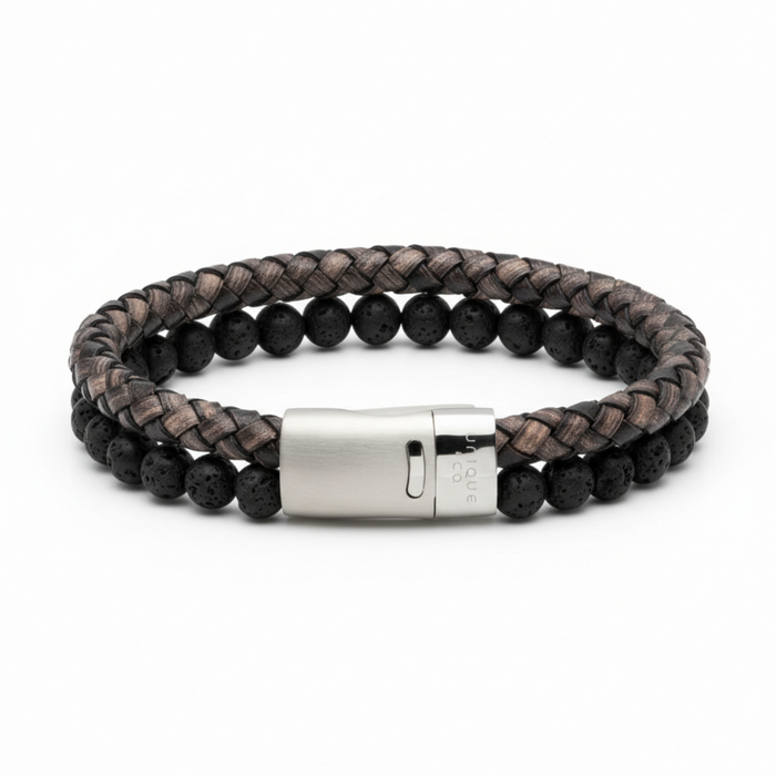 Black braided leather and lava stone bead bracelet with stainless steel magnetic clasp on a white background