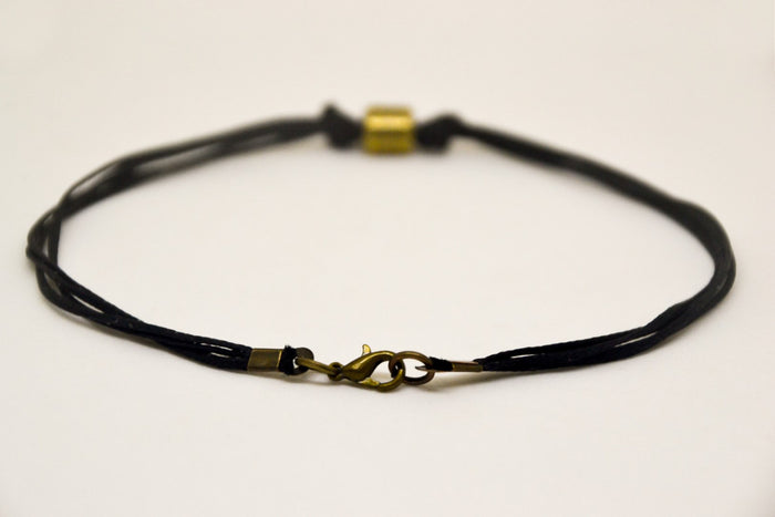 Men's anklet with a bronze tube charm and a black cord - shani-adi-jewerly