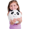 Child holding a panda-shaped ball against a white background