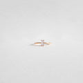 The Celia Ring by LLUME Jewelry features a vertical rectangular light pink gemstone set on a delicate gold-filled band, perfect for stacking. Shown against a plain white background.