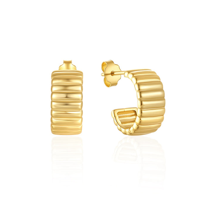 The Chloe Hoops by LLUME Jewelry, 18k gold plated with a ribbed, ridged texture, are shown on a white background—one facing forward and the other displaying its side profile and clasp.