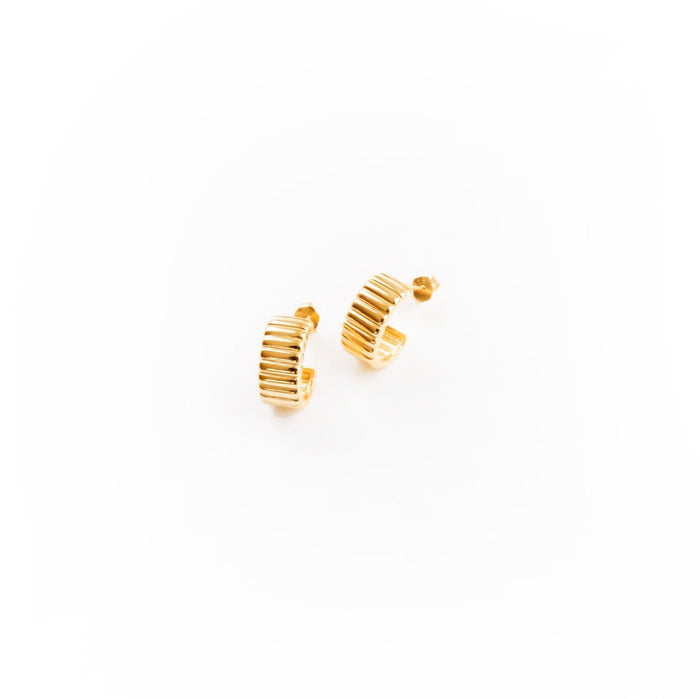 The Chloe Hoops by LLUME Jewelry are vintage-inspired gold hoop earrings with a textured, ridged design and 18k gold plating, shown on a plain white background.