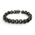 Chunky oxidised stainless steel skull bracelet with detailed skull links and secure clasp