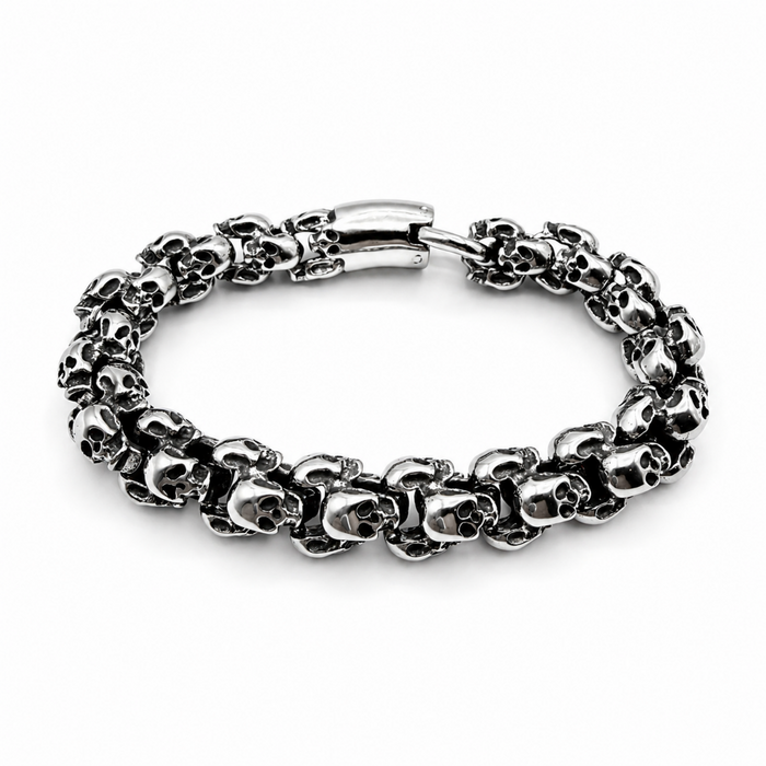 Chunky polished stainless steel skull bracelet with detailed skull links and secure clasp