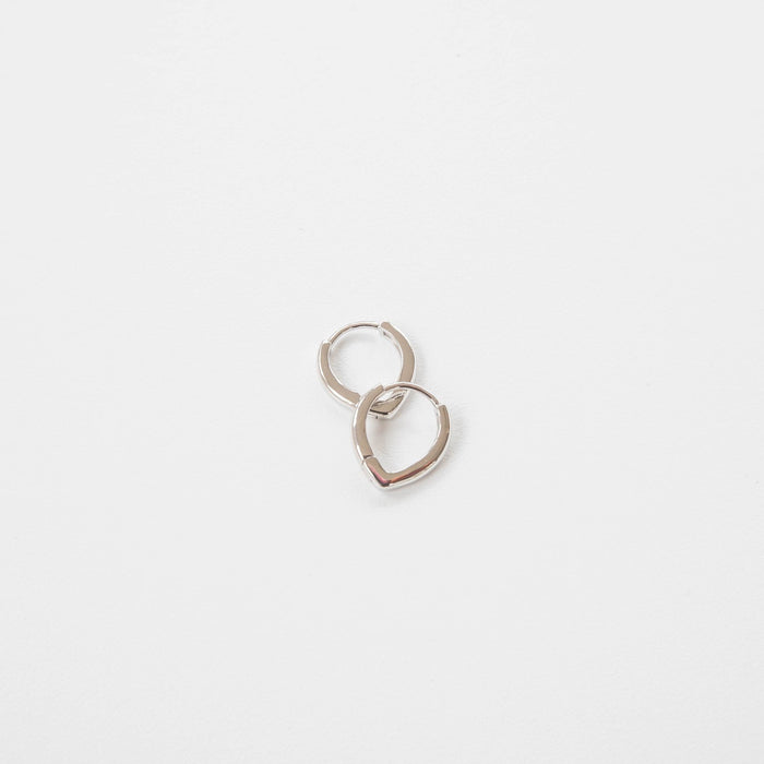 Two classic pointed hoops by LLUME Jewelry, crafted from 925 silver, overlap on a plain white background.