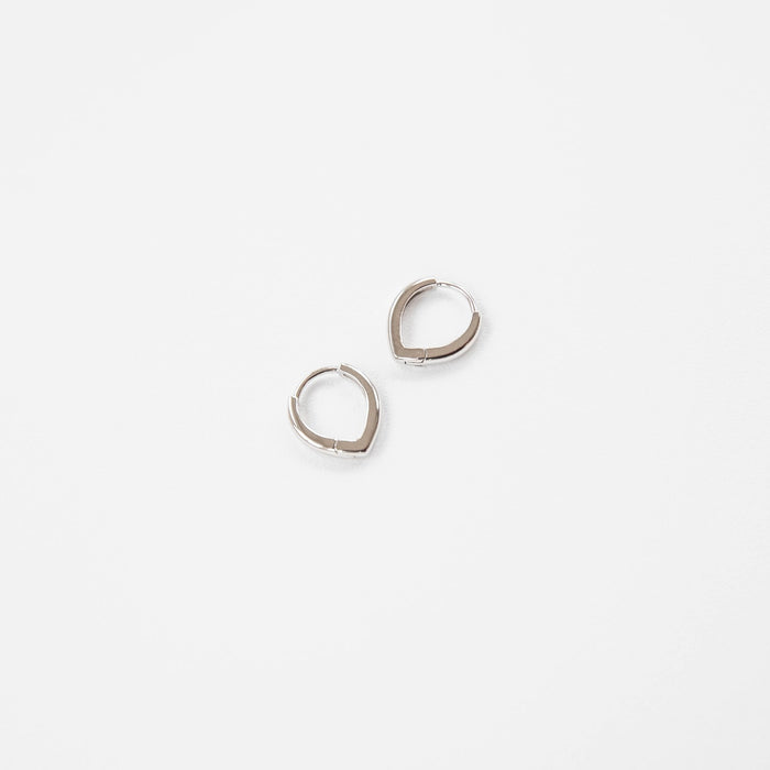 Two Classic Pointed Hoop Silver earrings by LLUME Jewelry, crafted from 925 silver, are displayed side by side on a plain white background.