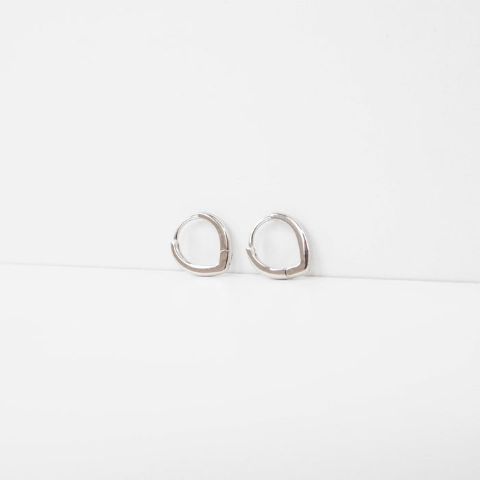 The LLUME Jewelry Classic Pointed Hoop Silver earrings are small, classic 925 silver hoops with a simple lever-back closure, shown on a clean white background.