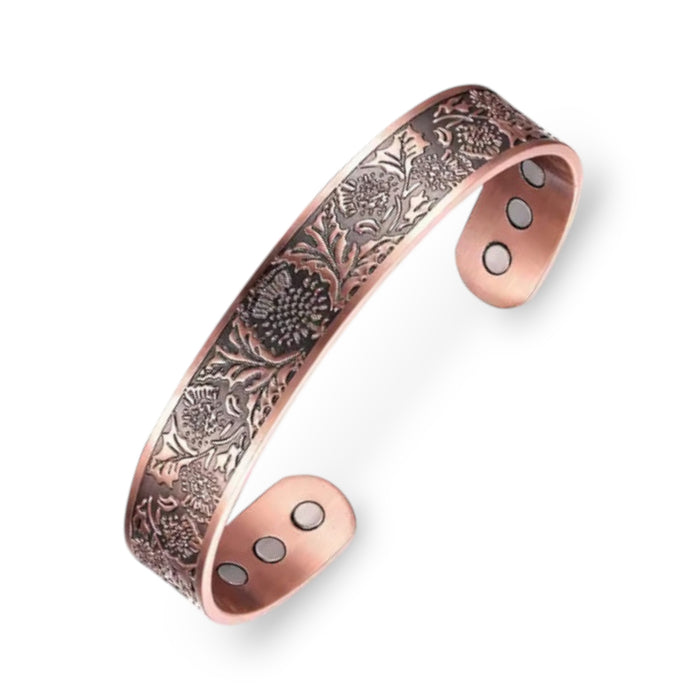 Copper cuff bracelet with embossed thistle pattern adjustable open design