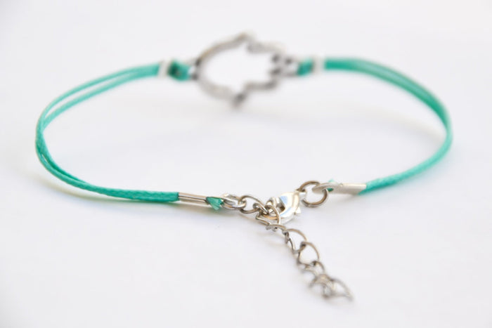 Turquoise cord bracelet with a silver hamsa charm - shani-adi-jewerly