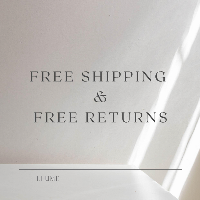 Text on a light background reads Free Shipping & Free Returns. Soft shadows and gentle light set the scene, with "LLUME Jewelry" subtly below—reflecting the classic style of the Day-to-Day Hoop.