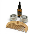 Dear Barber Beard Care Essentials gift set with beard oil, beard balm, moustache wax and pear wood beard comb on white background