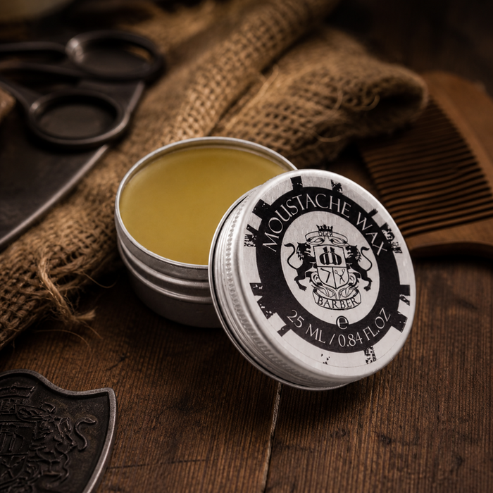 Open tin of Dear Barber Moustache Wax in a warm vintage barber style grooming scene