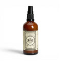 Dear Barber Post Shave Balm bottle with vintage style packaging on white background