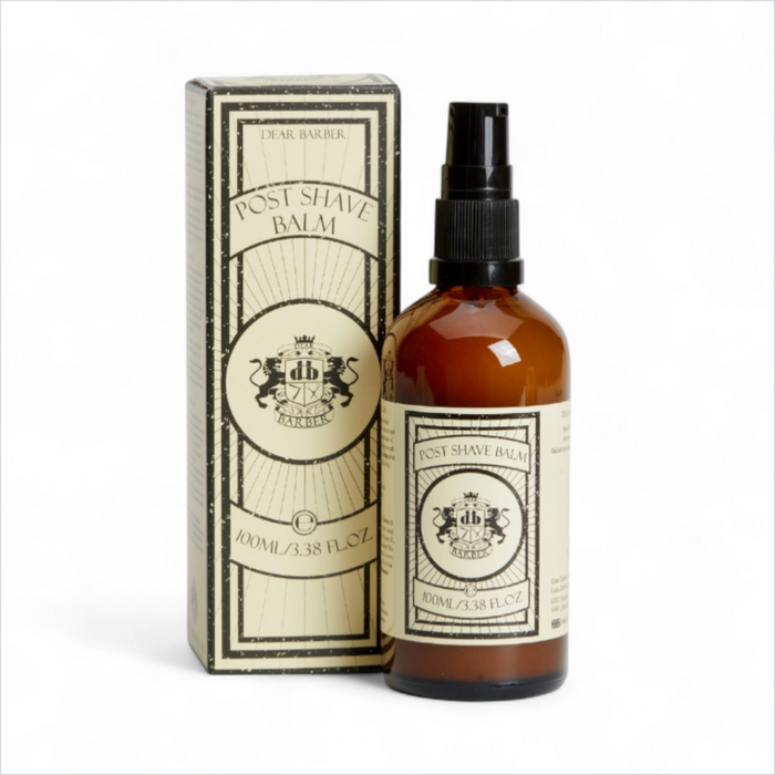 Dear Barber Post Shave Balm on classic barbershop counter with shaving tools and warm lighting