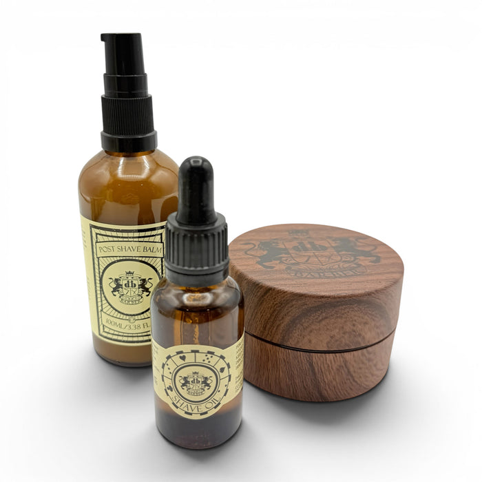 Dear Barber Shave Care Essentials Gift Set with shave oil, post shave balm and grooming products on a white background