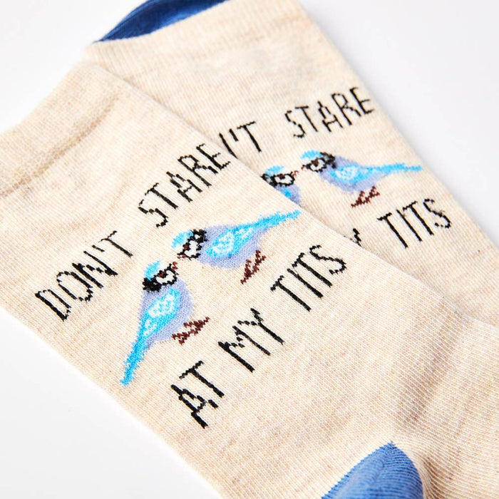 close up of Don’t Stare At My Tits socks showing text detail