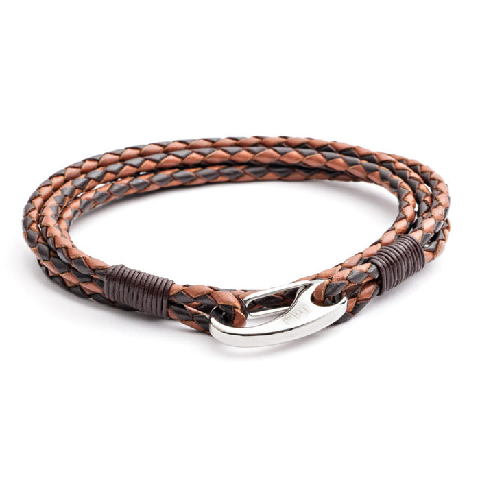 Double wrap braided leather bracelet in black and brown with stainless steel clasp on a clean white background