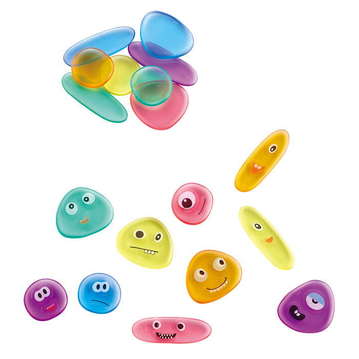 Colorful plastic monsters on a white background