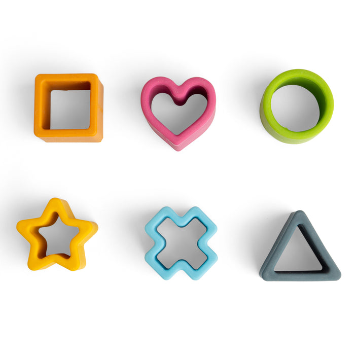 Set of colorful shape molds on a white background