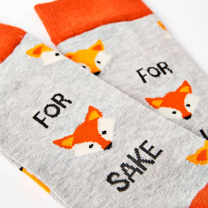 close up of For Fox Sake socks showing fox pattern and text
