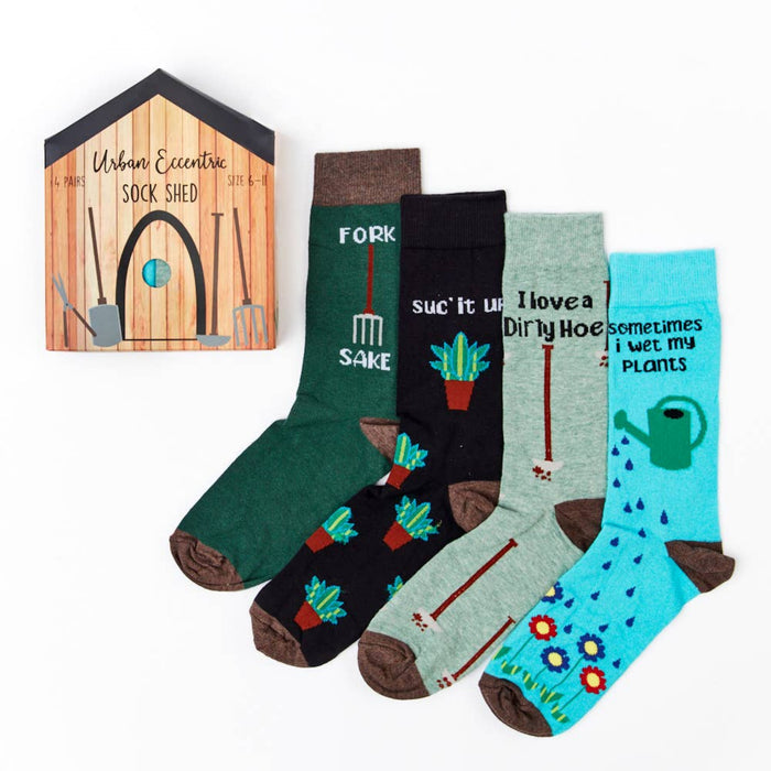 four pairs of gardening themed socks laid out with different designs