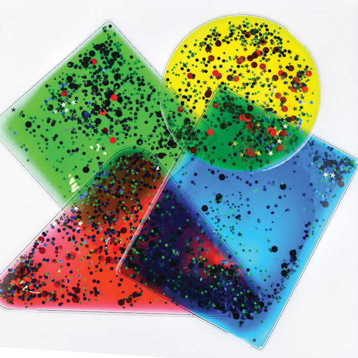Colorful translucent shapes with speckled patterns on a white background