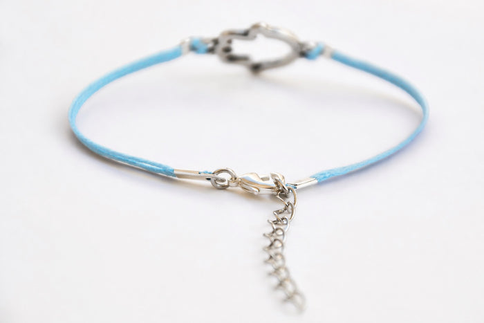 Blue cord bracelet with silver Hamsa charm - shani-adi-jewerly