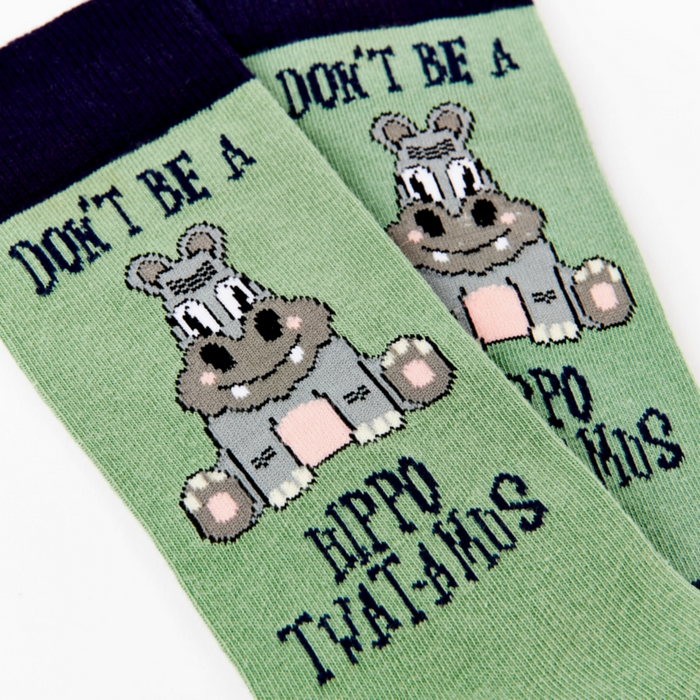 close up of Hippo-Twat-Amus socks showing hippo design and text