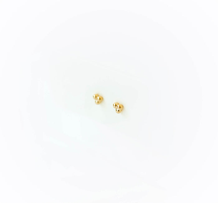 June Studs by LLUME Jewelry—small, round earrings with a minimalist design, crafted from gold plated sterling silver and shown on a white background.