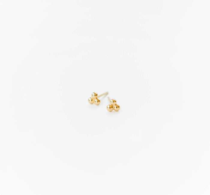 The June Studs by LLUME Jewelry are minimalist earrings with three rounded gold-plated sterling silver beads, shown on a plain white background.