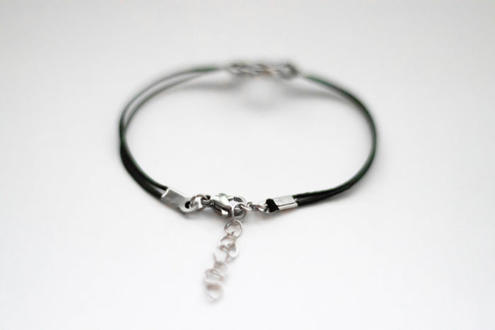 Karma bracelet, silver braided circle charm and black string, yoga jewelry - shani-adi-jewerly