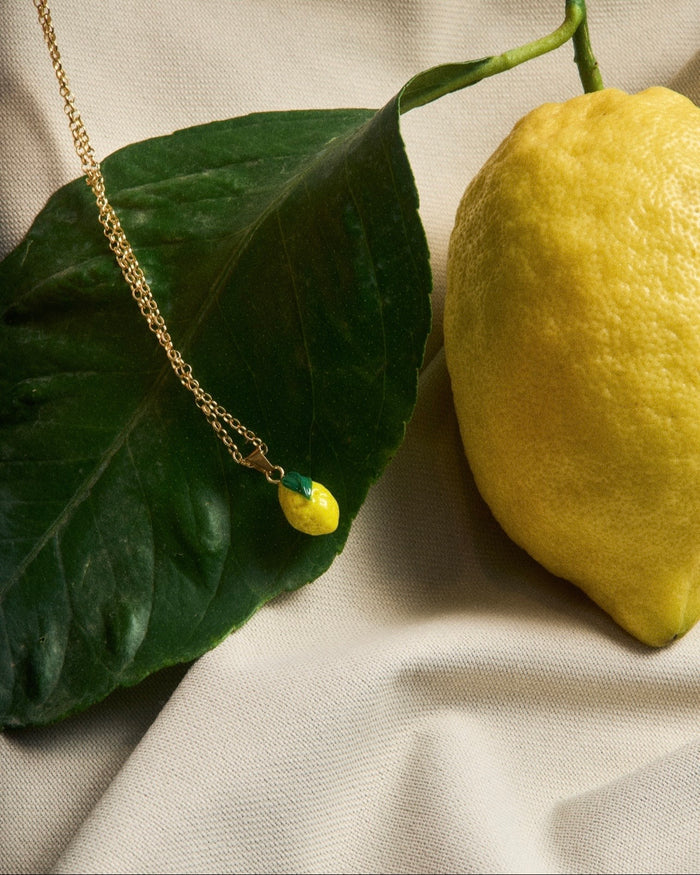 Necklace with lemon pendant
