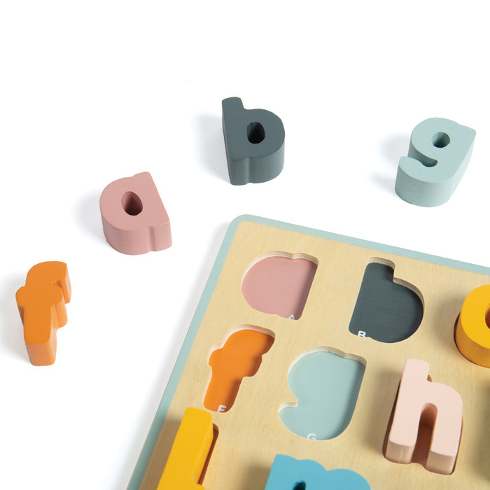 Colorful wooden letters on a white background