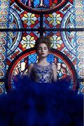 LUXURIOUS HI-LOW DRESS WITH BEADED BODICE AND MULTI LAYER SKIRT