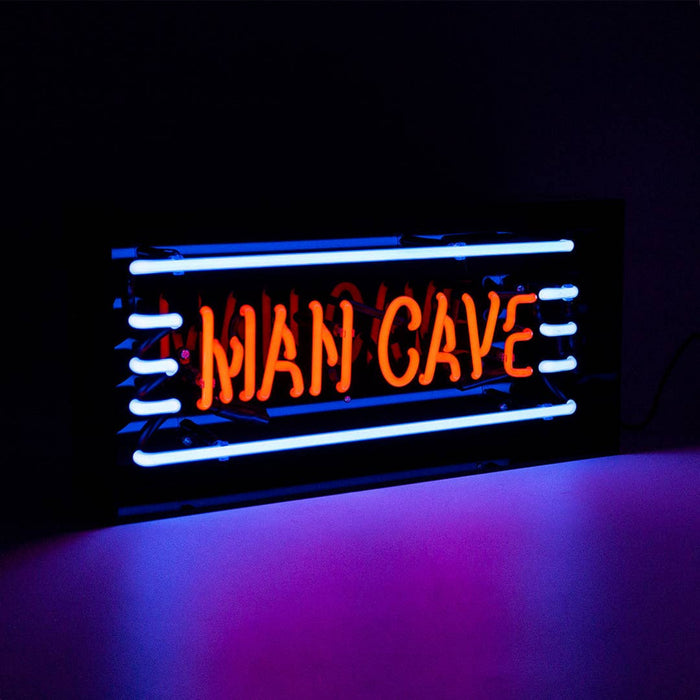 Man Cave glass neon sign with red and blue glow inside a clear acrylic display box