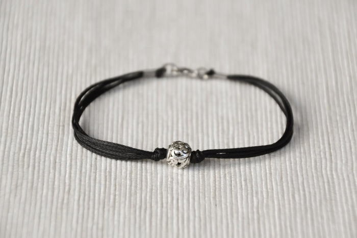 Men's bracelet with silver bead charm and a black cord - shani-adi-jewerly