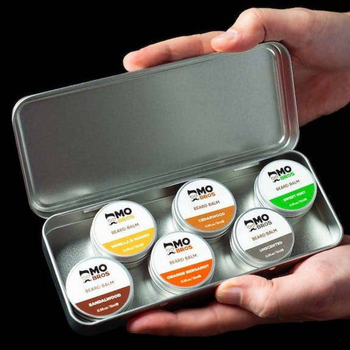 Mo Bros Beard Care Balm Gift Set inside an open silver travel tin