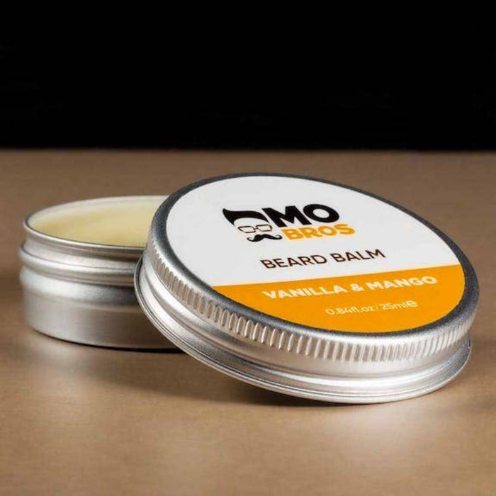 Open tin of Mo Bros Vanilla & Mango Beard Balm 25ml with natural balm texture