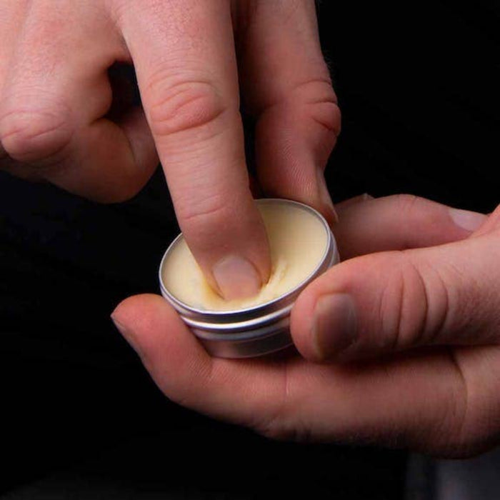 Applying Mo Bros Vanilla & Mango Beard Balm 25ml by fingertip