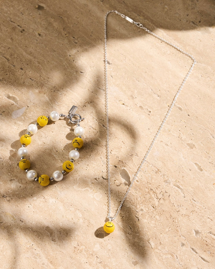 kette mit smiley anhänger