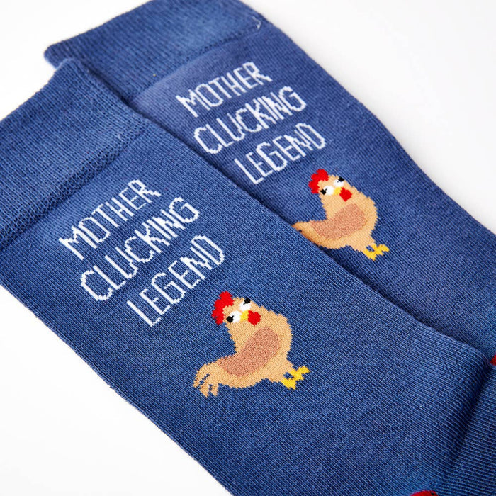 close up of Mother Clucking Legend socks showing chicken design and text