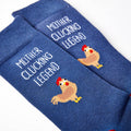 close up of Mother Clucking Legend socks showing chicken design and text