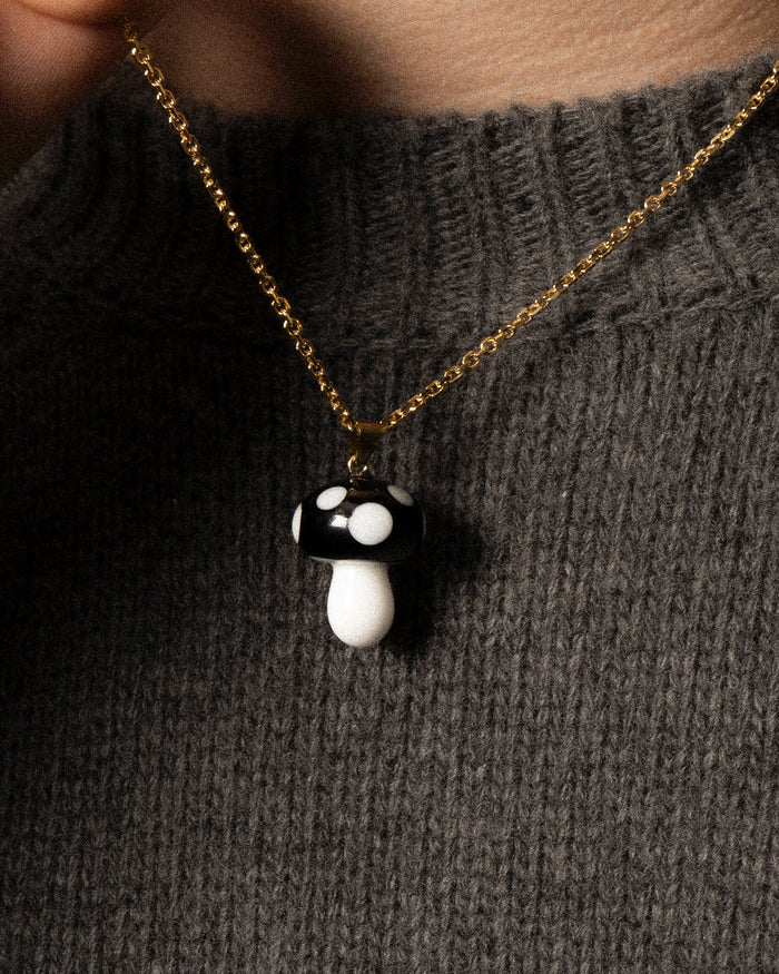 gold Necklace with black Mushroom