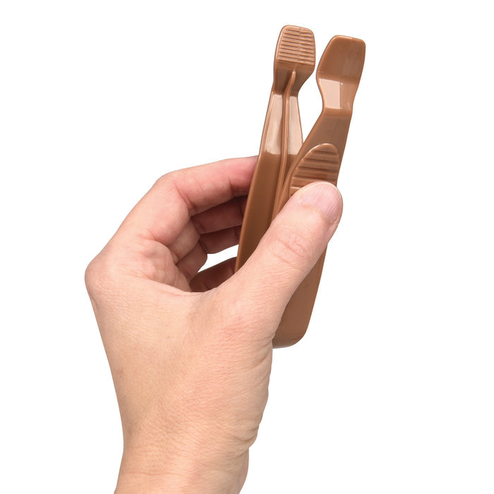 Hand holding a pair of brown tweezers against a white background