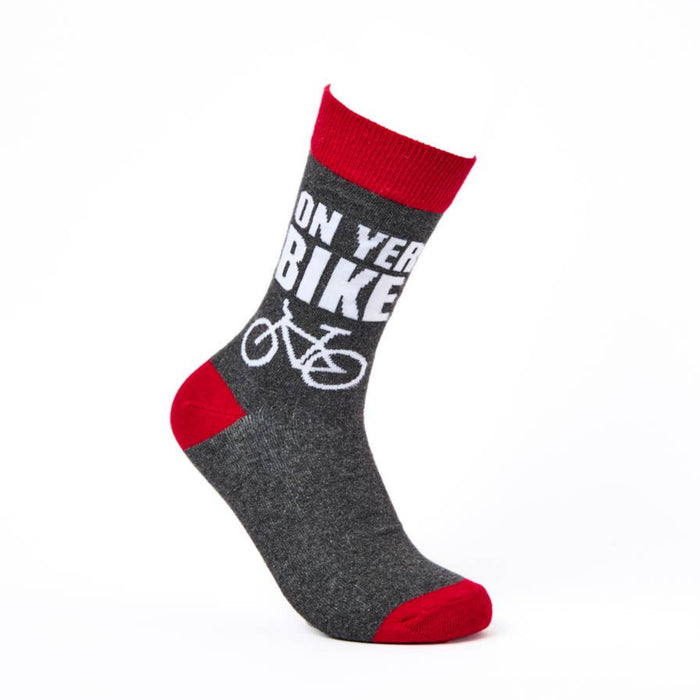 Novelty socks with on yer bike slogan and bicycle design on white background