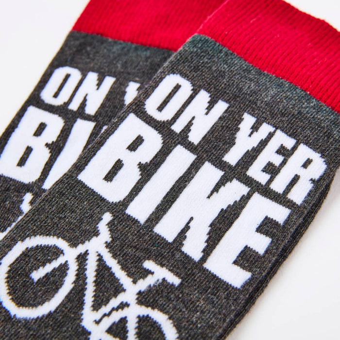 Close up of on yer bike text and bicycle design on socks