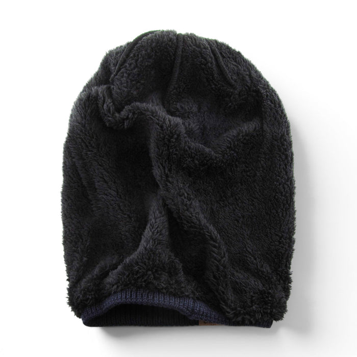 black oversized sherpa fleece lined slouch beanie showing inside lining.