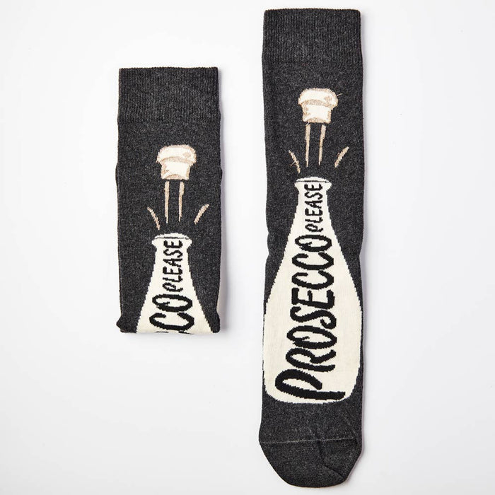 pair of prosecco themed socks with bottle and glass design
